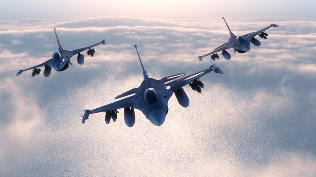 Three jet planes flying in the sky.